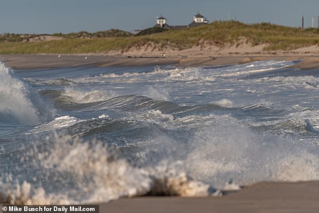 Waves are gathering in Shinnecock Inlet on Long Island as Hurricane Lee approaches Friday