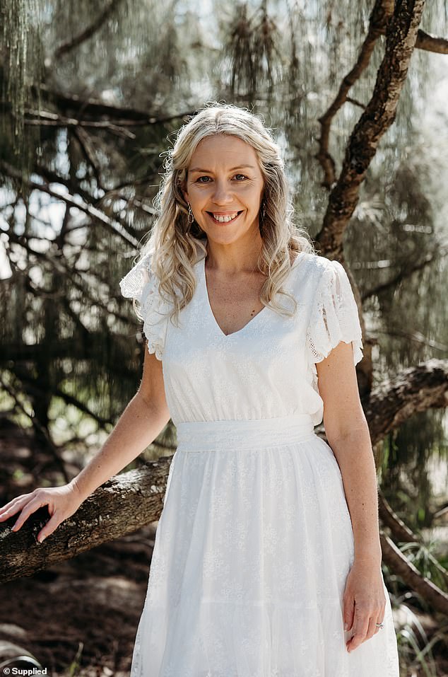 Angela Beckhouse (pictured) was diagnosed with stage two ovarian cancer in May 2022.  The 42-year-old had a six-inch tumor growing on her ovary, but she didn't know anything was wrong until she noticed her stomach was distended.