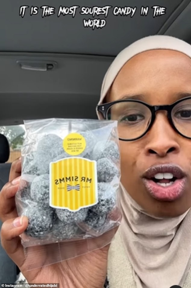 British influencer @underratedhijabi (pictured) is left in tears after trying the 'sourest candy in the world' on camera