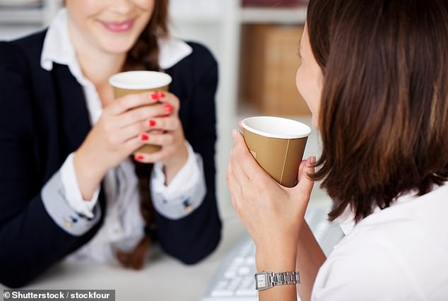 Dr.  Khaled Kasem, lead orthodontist at Impress in London, has listed the worst offenders when it comes to office snacks, as well as healthier alternatives to try (photo: stock photo of two colleagues enjoying a cup of tea)