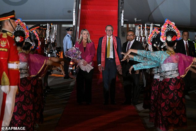 With support for an Indigenous Voice to Parliament plummeting and the Yes campaign bleeding money without any benefit, Anthony Albanese (pictured, with partner Jodie Haydon) spent a week abroad