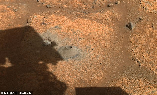 This photo taken by NASA's Perseverance rover on August 6, 2021, shows the hole drilled into a rock on Mars in preparation for the rover's first attempt to collect a sample