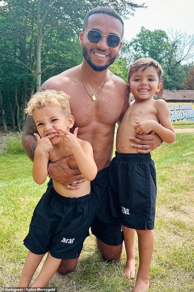 Carnage: The boy band - made up of Marvin Humes, Oritsé Williams, JB Gill and Aston Merrygold share eight children (Aston pictured with his sons, Grayson Jax, five, and Macaulay Shay, three)