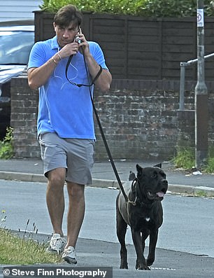 Man's best friend: The former Love Island winner walked his dog near his home in Swanley, Kent, close to where he was reportedly stopped by police on August 26