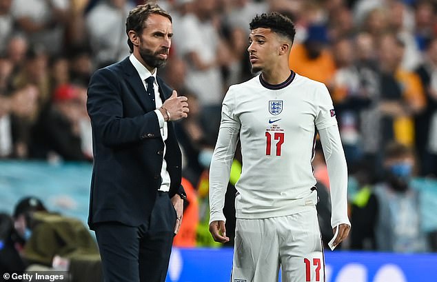 Gareth Southgate (left) has told Jadon Sancho (right) he can force his way back into the England set-up