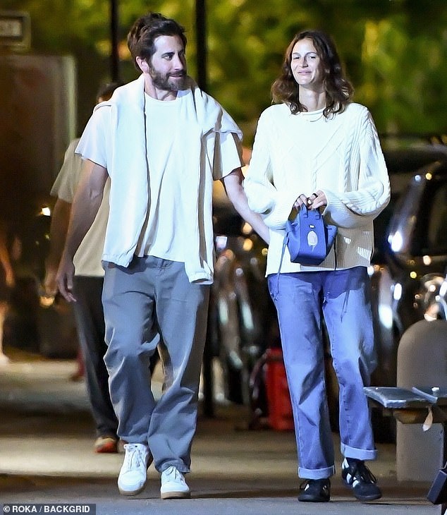 Date night!  Jake Gyllenhaal, 42, and his girlfriend of five years, Jeanne Cadieu, 27, were seen lovingly walking hand in hand on a date night in New York City on Saturday