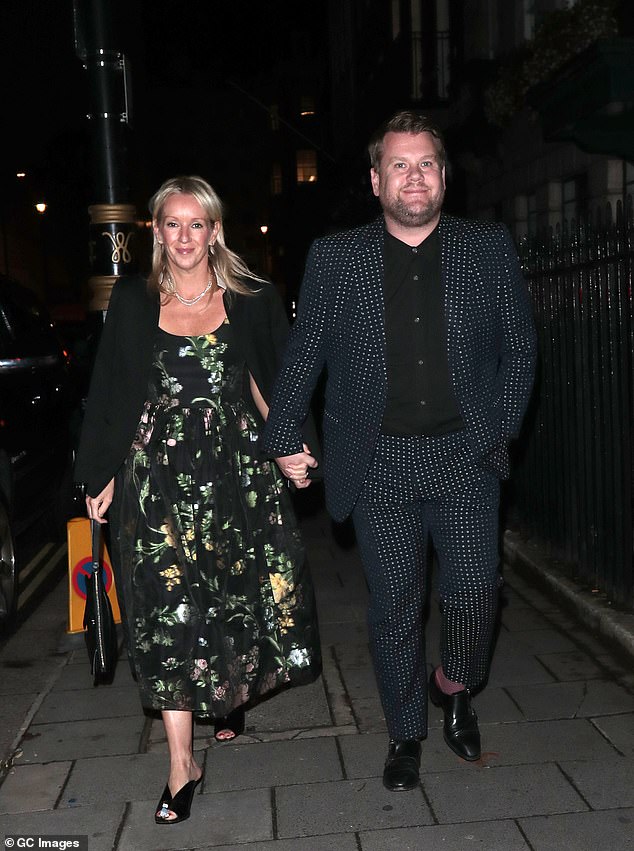 Power couple: James Corden, 45, and his wife Julia Carey, 47, looked stylish as they walked hand in hand after the Annabel's Gala on Thursday evening