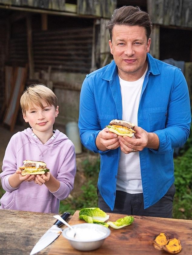 Jamie Oliver (right) says his 12-year-old son Buddy (left) learned his impressive cooking skills through sheer practice and dedication