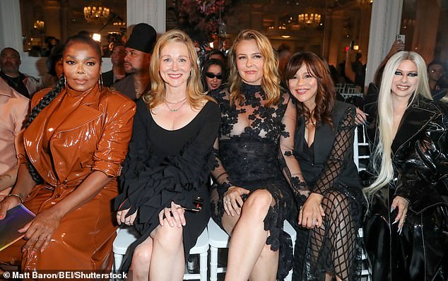 Good company: Jackson sat next to Laura Linney, Alicia Silverstone, Rosie Perez and Avril Lavigne at the event