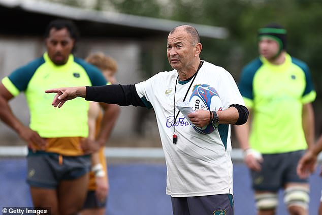 Jones (pictured training with the Wallabies at the World Cup) explicitly refused to deny reports that he had a job interview just days before the tournament