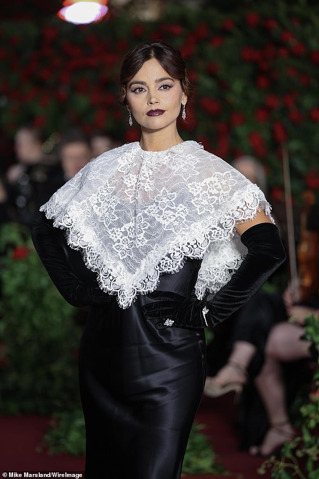 Vintage: Ahead of the event, Jenna turned back the clock in a vintage Hollywood-style ensemble as she hit the red carpet at the Vogue World show in London on Thursday