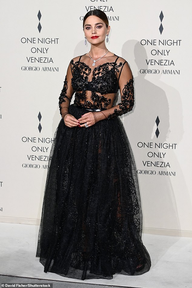 A vision: Jenna's dress featured a studded bodice and sheer sleeves, paired with a full-length flowing skirt