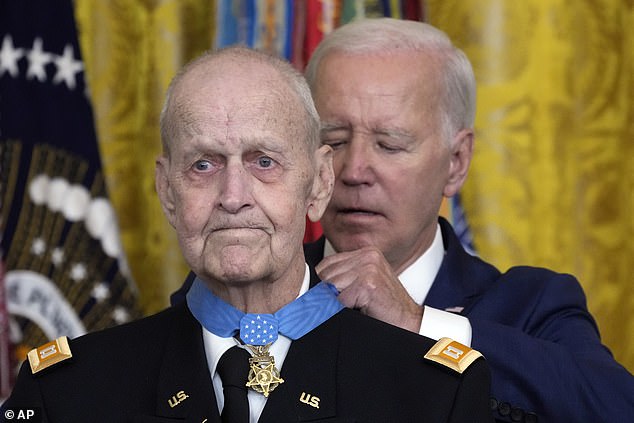 President Joe Biden awards the Medal of Honor to Captain Larry Taylor, a Vietnam War Army pilot who risked his life to save a reconnaissance team on the verge of being overrun by the enemy