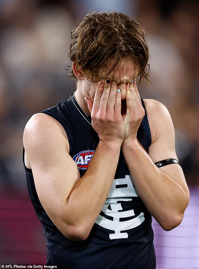 A photo of Carlton's Jordan Boyd (pictured) has sparked fierce online debate after a photo of him holding his hands to his face after the Blues' loss to Brisbane went viral