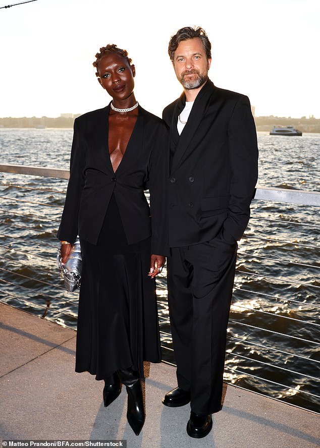 Couple: Joshua Jackson beamed with his glamorous wife Jodie Turner-Smith as they attended the COS Autumn/Winter show during New York Fashion Week on Tuesday