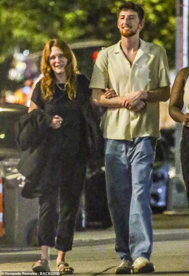 On the road: Julianne Moore was spotted this week on a night out on the town in New York with her son Caleb Freundlich, 25