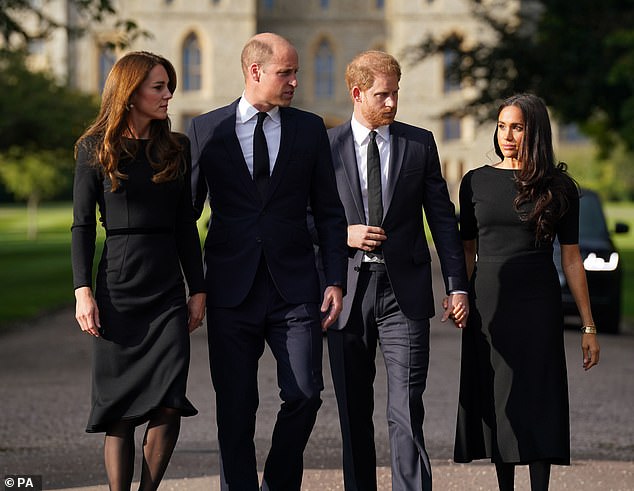 As they made their way to the floral tributes, Kate and William walked mostly separately, occasionally reaching out and touching each other.  Meanwhile, Harry and Meghan stayed in touch most of the time, often holding hands