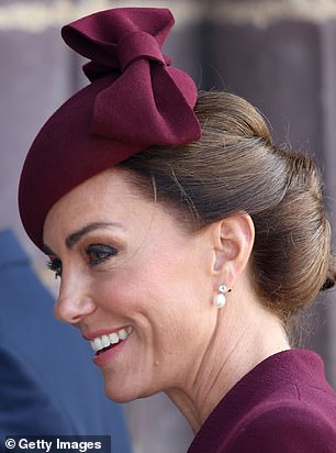 Kate, 41, wore a burgundy hat from Sahar Millinery, to match her elegant coat from London-based designer Eponine, for the church service at St Davids Cathedral in Pembrokeshire