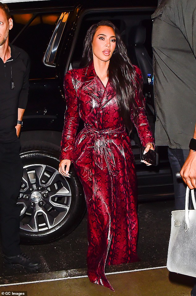 Red hot!  Kim Kardashian showed off her incredible sense of style as she headed out for dinner during New York Fashion Week on Monday