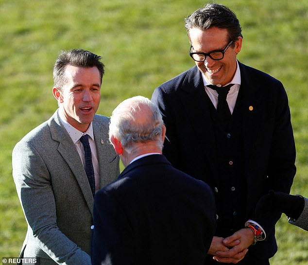 Wrexham Football Club co-owners Ryan Reynolds and Rob McElhenney welcome King Charles to Wrexham, Wales, on December 9, 2022