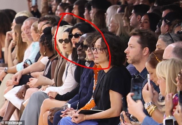 There she is: Kylie slipped past the waiting cameras unnoticed and took a front row seat next to outgoing British Vogue editor-in-chief Edward Enninful