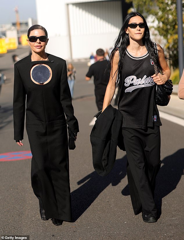 Sensational: Lisa Rinna, 60, looked stylish in a black cut-out dress alongside her daughter Amelia Gray Hamlin, 22, as the pair attended Paris Fashion Week on Wednesday