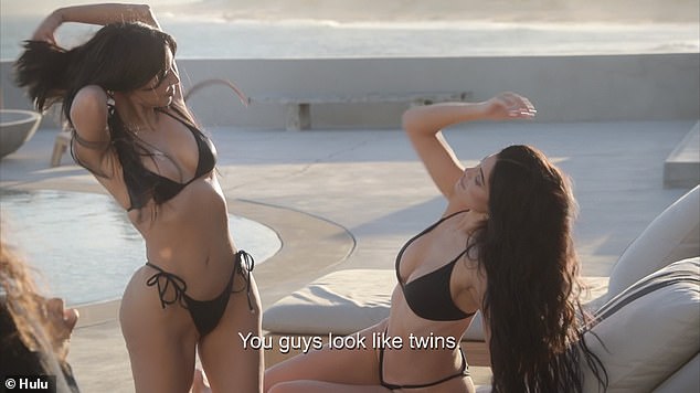 Twins: Kim and Kylie are both wearing very similar (if not identical) black string bikinis, as the photographer says: 'You look like twins'