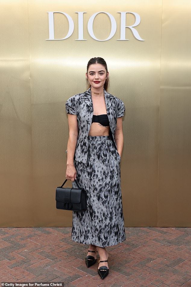 Chic!  Lucy Hale looked stylish as ever as she attended a star-studded Dior event during New York Fashion Week at the Brooklyn Botanic Gardens on Thursday