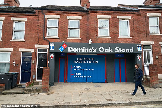 The Oak Stand on Kenilworth Road has been given a new look following a deal with pizza chain Dominos