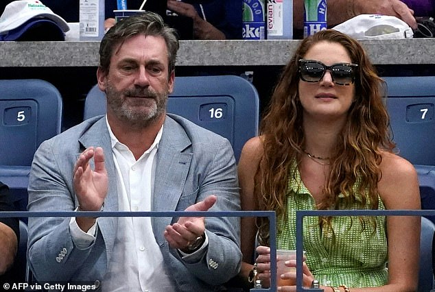 Couple: Jon Hamm and wife Anna Osceola watched the men's singles final at the US Open in New York City on Sunday