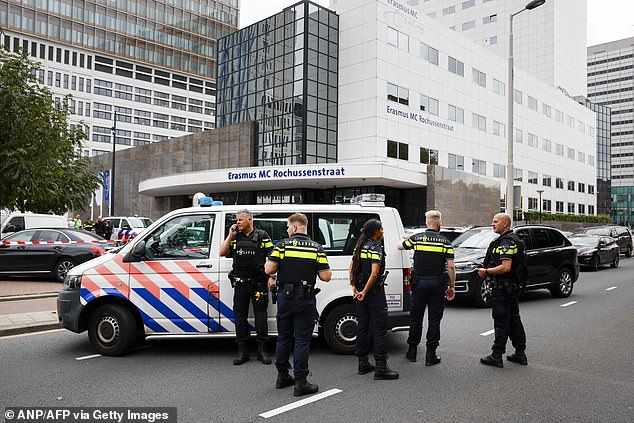 Dutch police officers gather at the entrance of the Erasmus University Medical Center (Erasmus MC) in Rotterdam on September 28, 2023