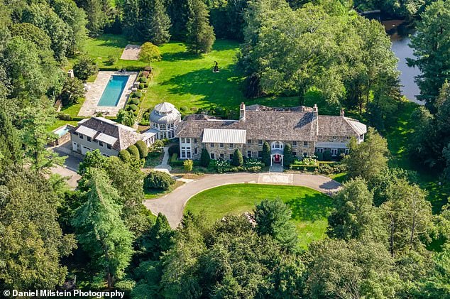 The 14,000-square-foot mansion is located in Greenwich, Connecticut, close enough to Manhattan to keep Moore from getting bored, but also private and serene.