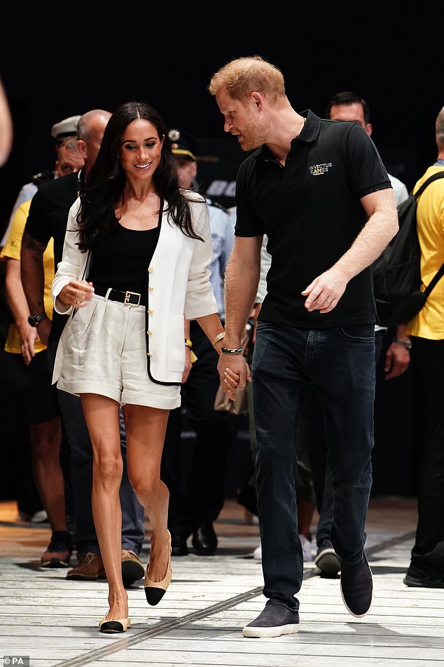 To add even more glamor to the look as she entered the arena to watch the wheelchair basketball, the royal wore Princess Diana's £17,800 Cartier watch and a $62,000 Lorraine Schwartz pinky ring made with 'diamonds donated from the Middle East'.