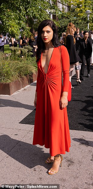 Phoebe, a student at Stanford University and an aspiring fashion entrepreneur herself, wore a plunging red dress, paired with strappy sandals, a red bag, bold red lip and a dramatic side part for her jet black hair.