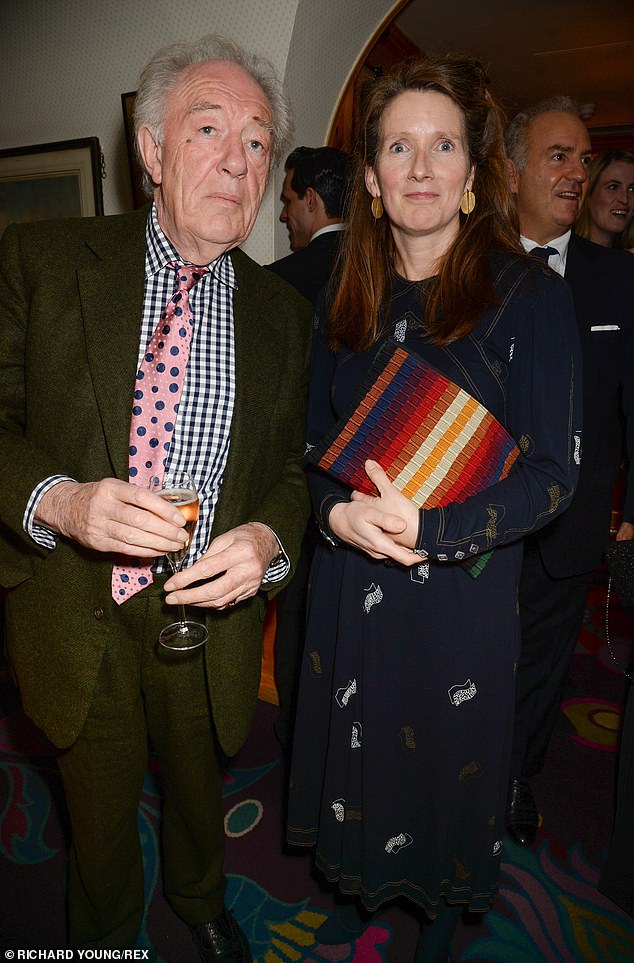 Sir Michael had a second family with set designer Philippa Hart, who is 25 years his junior, and bore him two more sons.  Above: The couple at dinner at Annabel's in London in 2015