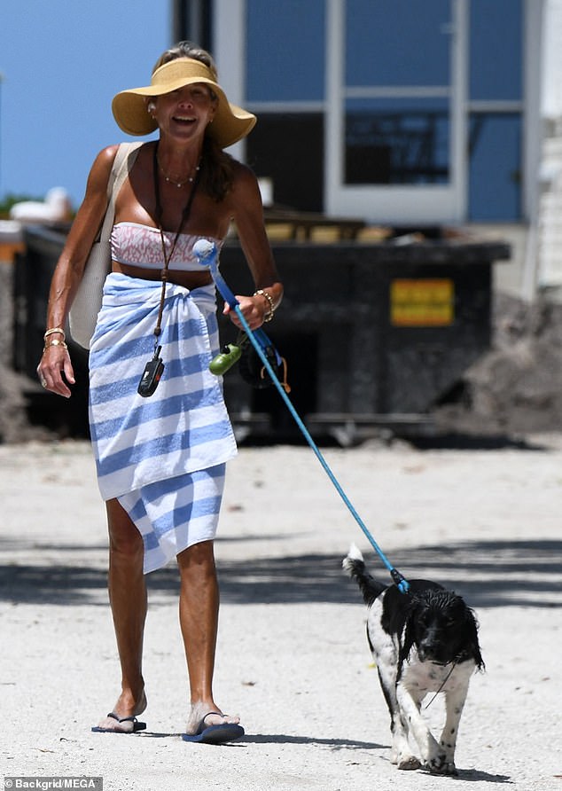 Carlson's wife Susie was walking one of the couple's four dogs near their Florida home