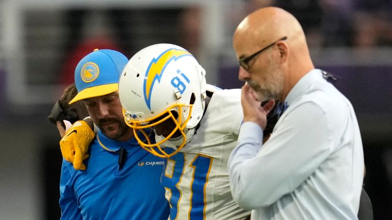 Williams is helped off the field against the Vikings