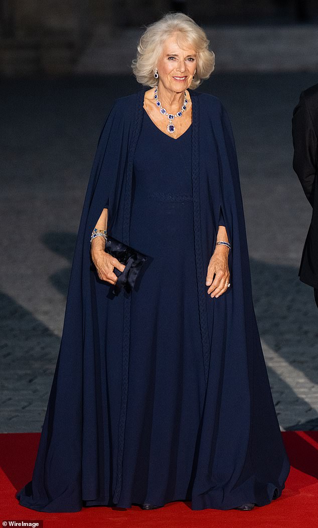 And Camilla's cape dress gets my vote as her chicest look ever.  My goodness, what a statement!