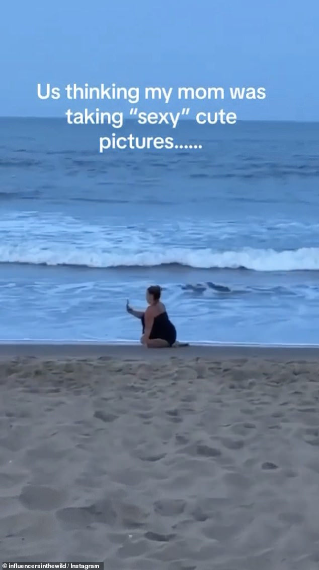 A video of a mum posing for provocative 'selfies' on the beach has gone viral... but there's a healthy twist