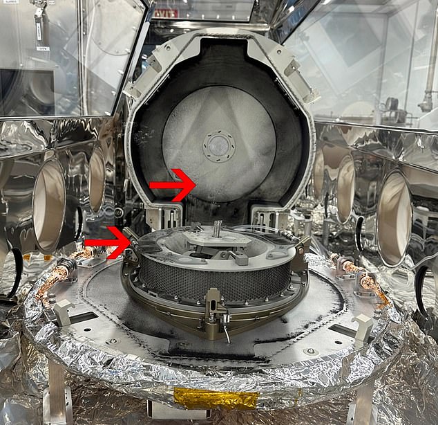 Scientists today broke open the canister and found unidentified elements on the Touch and Go Sample Acquisition Mechanism (TAGSAM) on top of the avionics deck