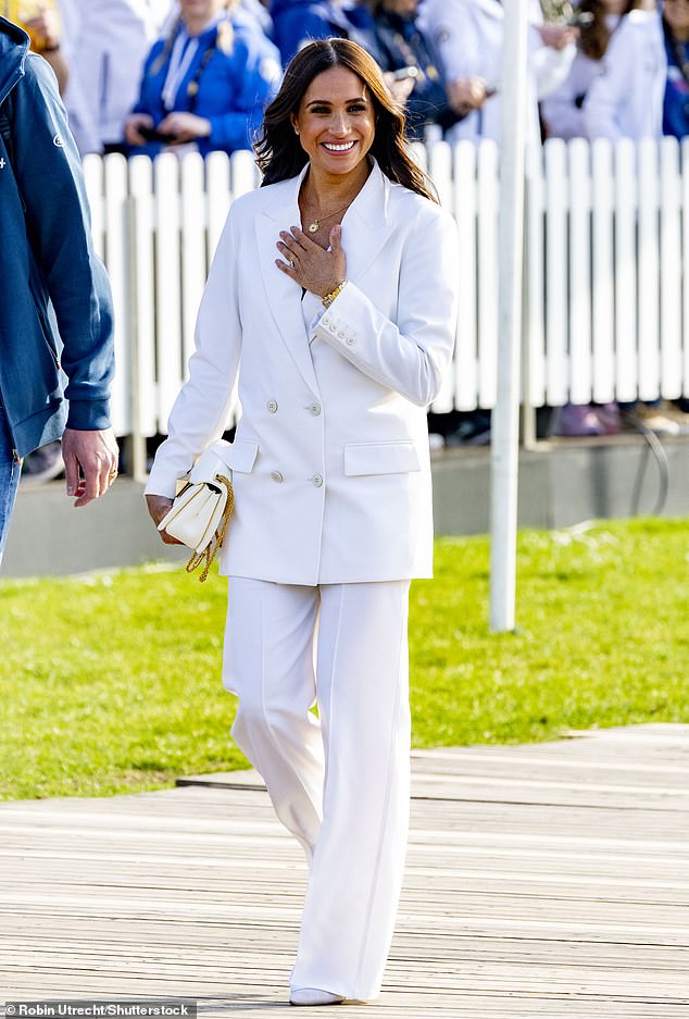 Meghan Markle arrives on the yellow carpet ahead of the 2022 Invictus Games