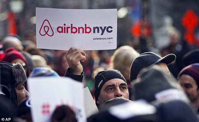 Airbnb supporters hold a rally outside City Hall in New York in 2015