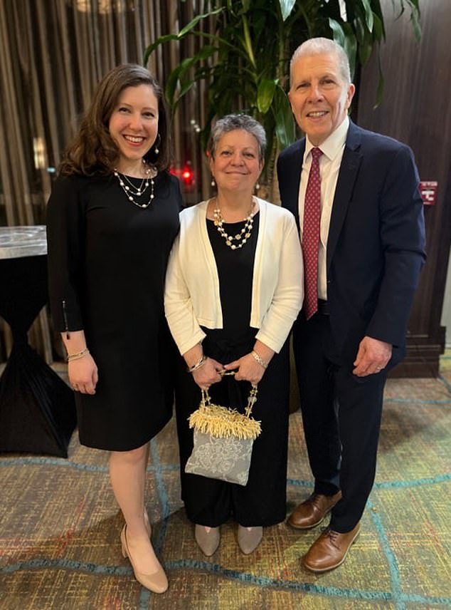 Gerard Vanderberg (right) with his daughter Caitlin (far left) and his wife Silvana during a fundraising gala in April this year