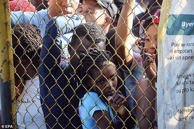 Migrants wait to obtain their documents at the offices of the Mexican Refugee Assistance Commission in Tapachula, a border town in the southern Guatemalan state of Chiapas, opposite Guatemala.