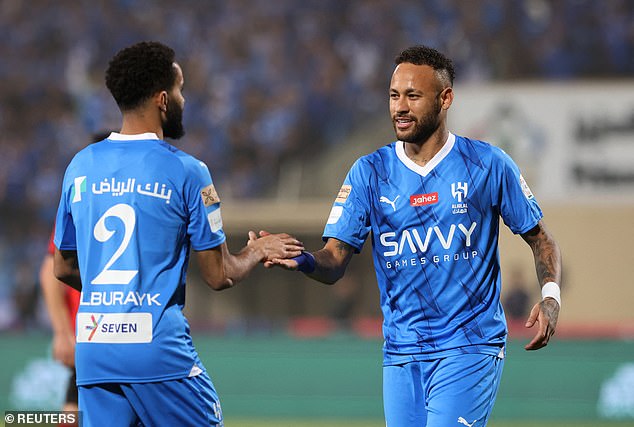 Neymar (right) was all smiles as he made his debut for Saudi Pro League team Al-Hilal on Friday