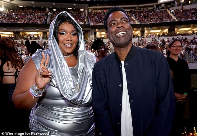 Here she is: Lizzo supported Beyoncé on her Renaissance tour Monday night as she attended her 42nd birthday tour in California (pictured with Chris Rock)