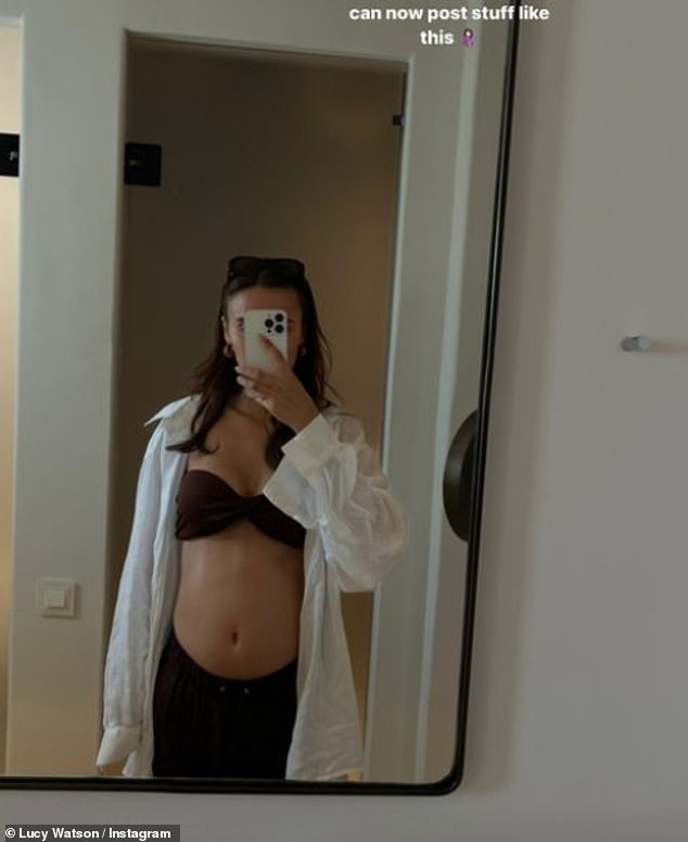 Expectant mother!  Lucy Watson showed off her baby bump in a brown bikini top as she posed for a mirror selfie while on holiday in Greece on Thursday