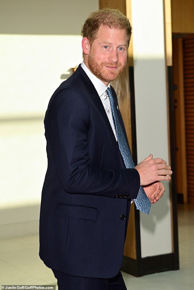 Prince Harry returned to Britain for the first time in three months today to attend a charity awards ceremony on the eve of the Queen's death.