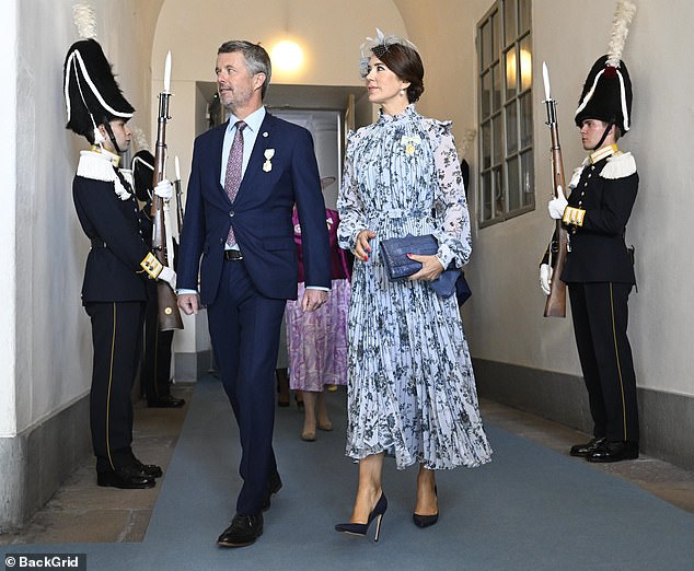 Princess Mary was as stylish as ever as she attended royal duties on Thursday.  Mary's husband, Frederik, was also present.  Both shown