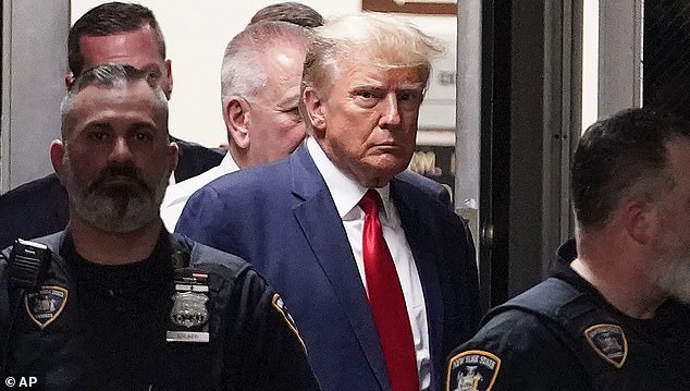 Yuscil Taveras, previously identified as 'Trump Employee 4', appears to have changed his story and will testify against the former president.  Pictured: Donald Trump in a Manhattan courtroom in April